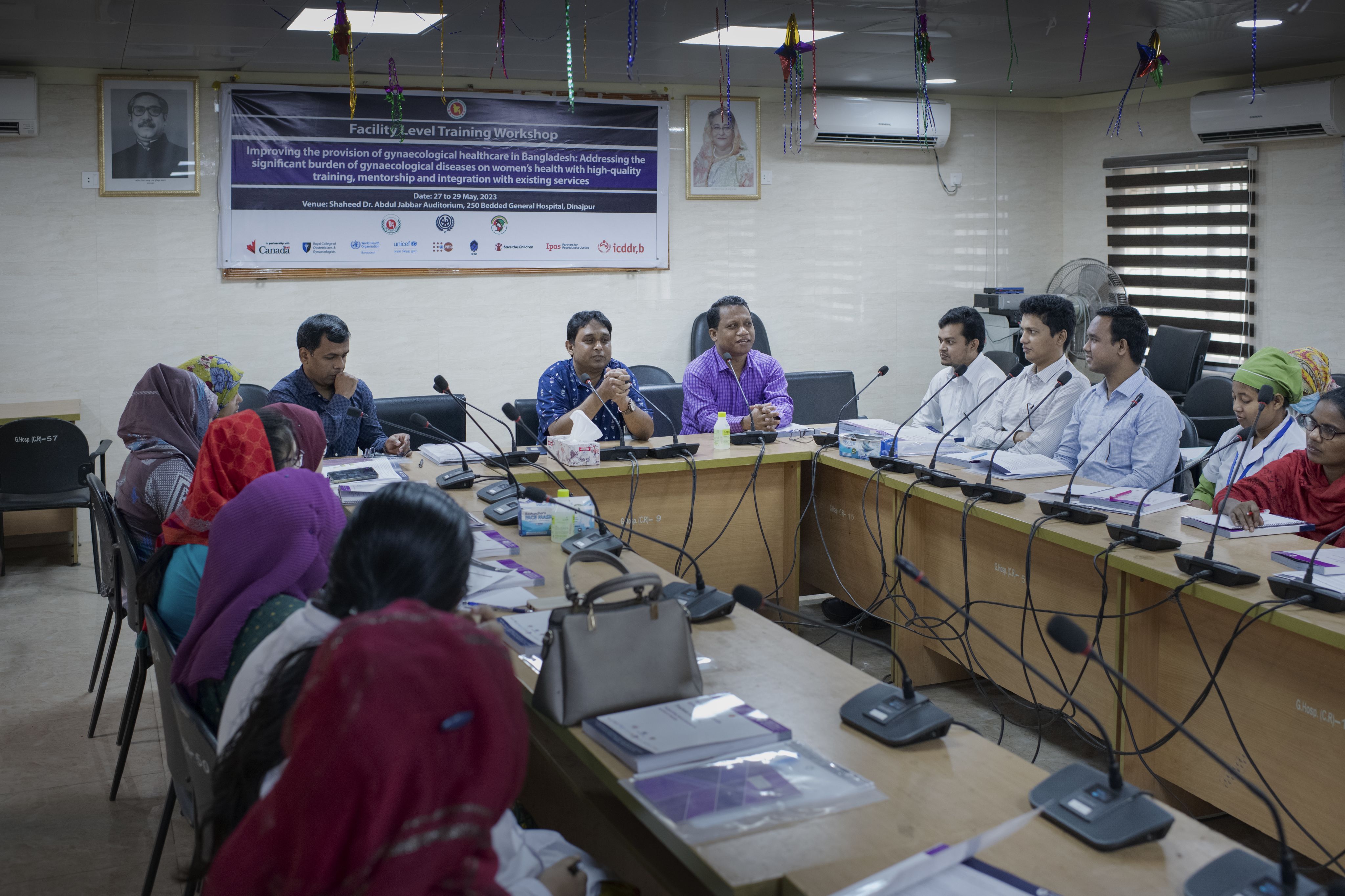 Panel discussion of people with microphones